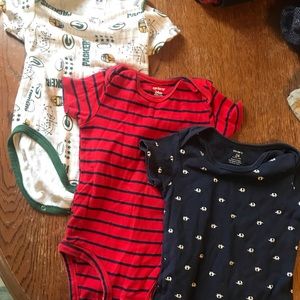 3 one piece T-shirt’s , gently used .